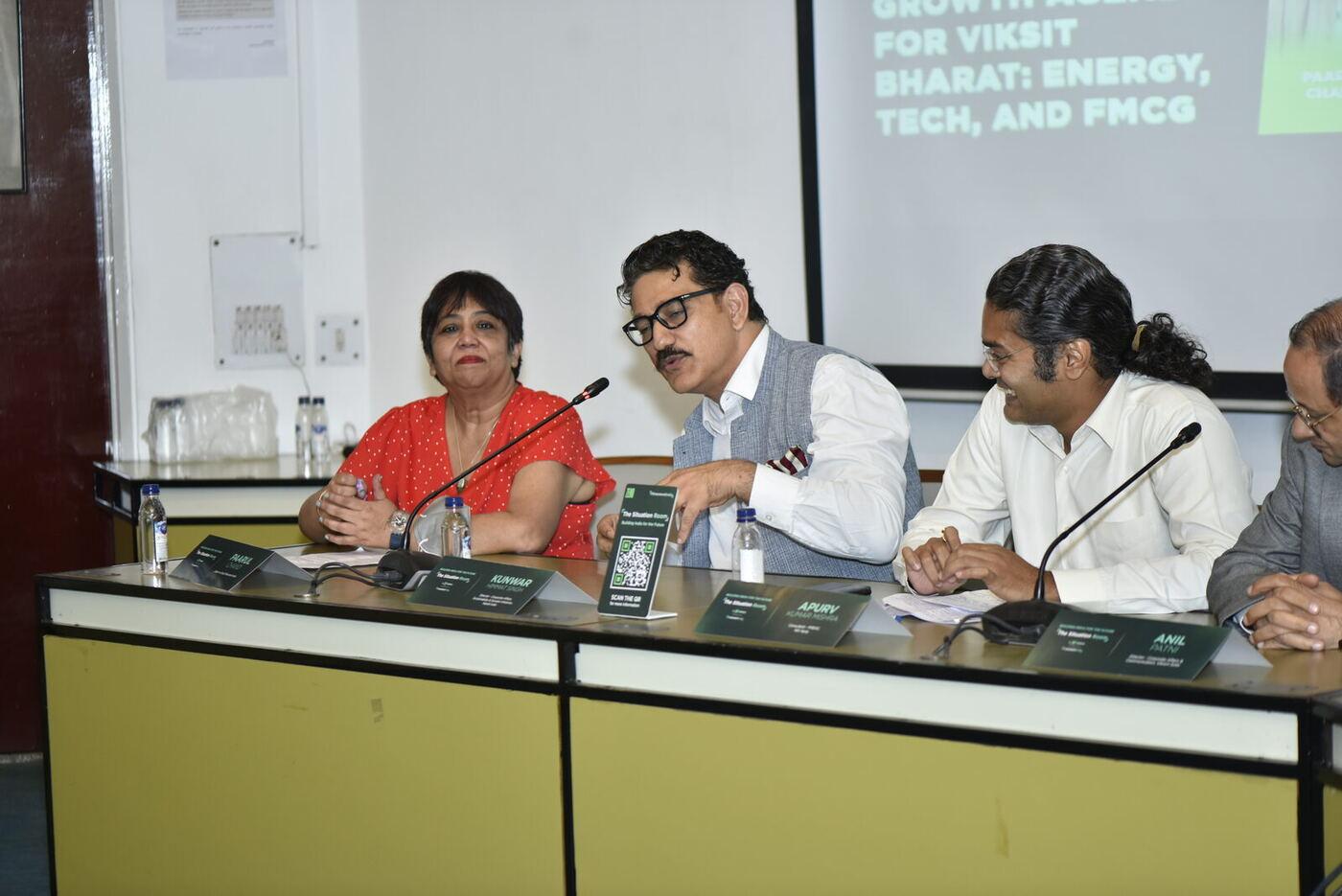 Session 2 panel: Kunwar leaning to the mic, Apurv Kumar Mishra laughing beside him